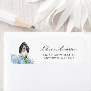 Schwarz-weißer Cocker Spaniel Blaue Hortensie