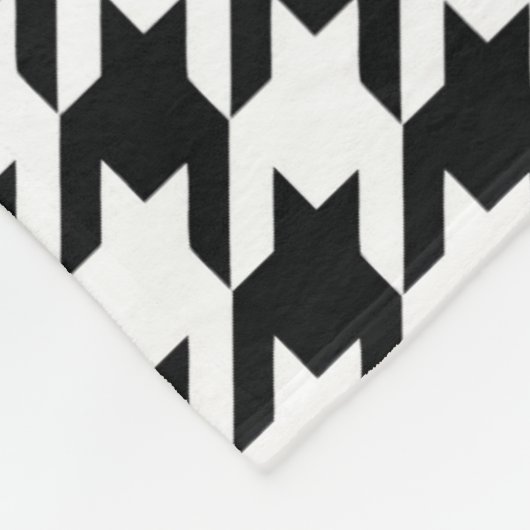 Schwarz-weißer Karo des klassischen Hahnentrittmus Fleecedecke (Ecke)