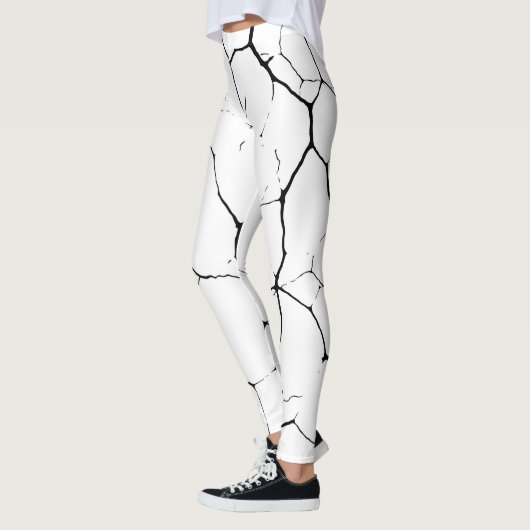 Schwarz-weißes Kintsuggermuster Leggings (Links)