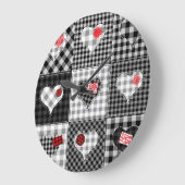 Schwarz-weißes Patchwork ist nahtlos. Große Wanduhr (Winkel)