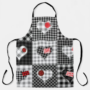Schwarz-weißes Patchwork ist nahtlos. Schürze