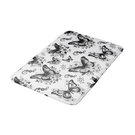 Schwarz-weißes Schmetterlingsmuster Badematte (Schrägansicht)