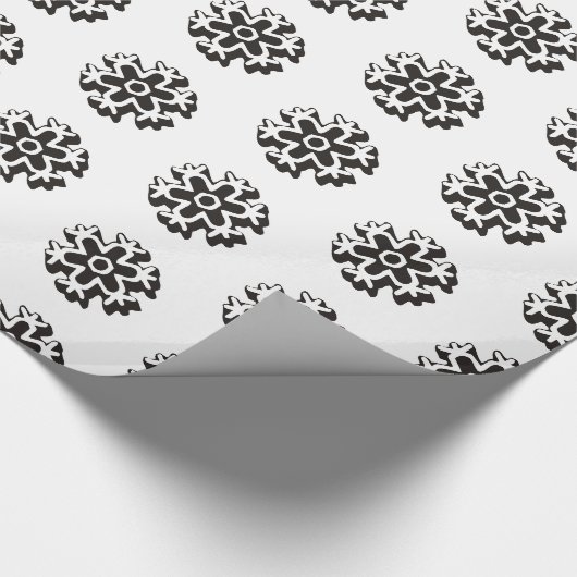 Schwarz-weißes Schneeflockenmuster Geschenkpapier (Ecke)