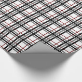 Schwarz-weißes und rotes kariertes geschenkpapier (Ecke)