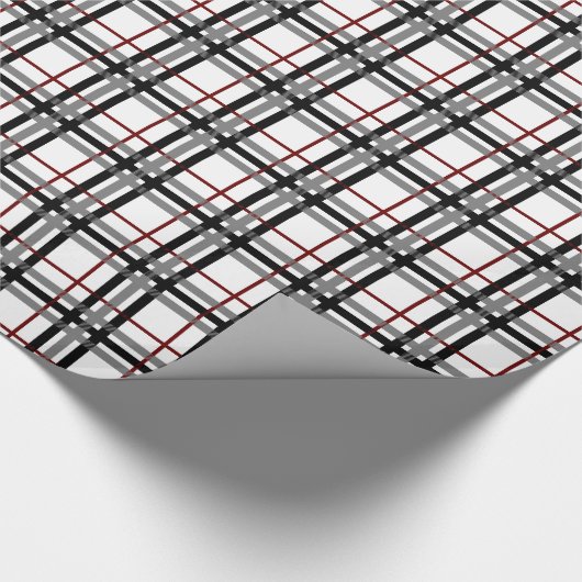 Schwarz-weißes und rotes kariertes geschenkpapier (Ecke)