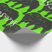 Schwarze Angus-Stiere u. rotes Geschenkpapier (Ecke)