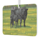 Schwarze Anguskühe und Niedliches Kalb im Sommerwe Autolufterfrischer (Links)