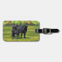 Schwarze Anguskühe und Niedliches Kalb im Sommerwe