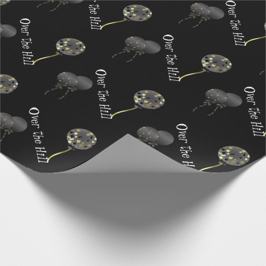 Schwarze Ballone über dem Hügel-Packpapier Geschenkpapier (Ecke)
