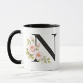 Schwarze Blumenmonogramm-N-Tasse Tasse (Links)