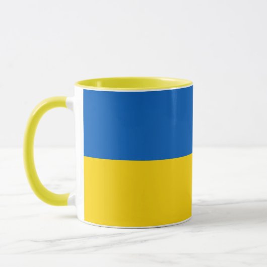 Schwarze Combo-Tasse mit ukrainischer Flagge Tasse (Links)