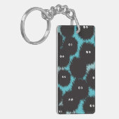 Schwarze Flaute-Monster Schlüsselanhänger (Vorderseite links)