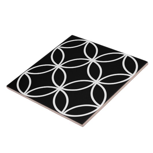 Schwarze Fliese, weißes, sich wiederholendes Faltb Fliese (Seite)