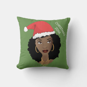Schwarze Frau, rote Weihnachtsmannmütze, aktuelles Kissen