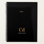 Schwarze Gold-Monogramm-Initialen 2025-Planer Planer<br><div class="desc">Bleibe stilvoll organisiert mit dem "Black Gold Monogram 2025 Planner". Dieser elegante und moderne Planer verbindet zeitloses Schwarz mit eleganten Goldakzenten und schafft ein anspruchsvolles Design, das sich perfekt für den persönlichen oder beruflichen Gebrauch eignet. Die individuell anpassbare Monogramm-Funktion erlaubt es Ihnen, Ihre Initialen hinzuzufügen, sodass sie einzigartig Ihre oder...</div>