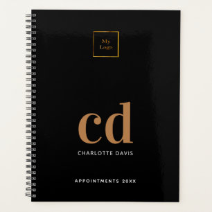 Schwarze Goldmonogramm-Initialen Geschäftslogo Planer