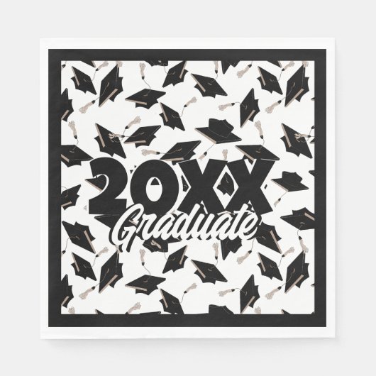 Schwarze Graduierungsklappen in der Luft auf Weiß Serviette (Vorderseite)