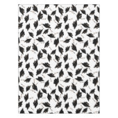 Schwarze Graduierungsklappen in der Luft auf Weiß Tischdecke (Vorderseite)