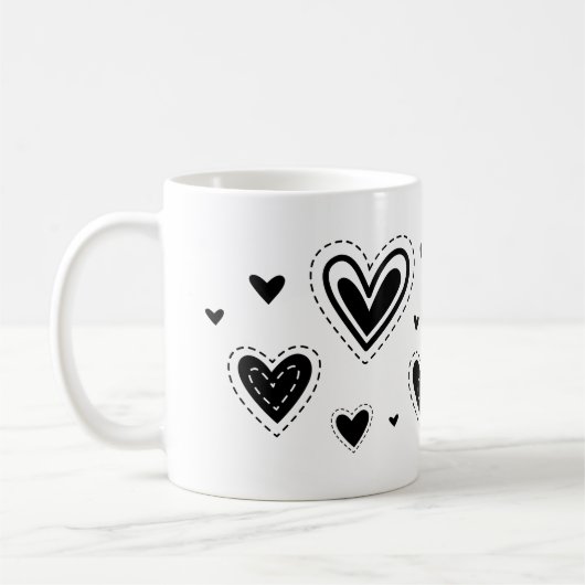 Schwarze Herzen, verschiedene Herzdesigns Kaffeetasse (Links)