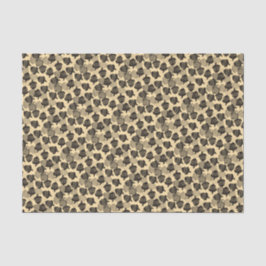 Schwarze Holzkörner auf Creme Seidenpapier