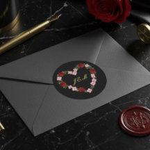schwarze Initiale mit rosa floralem Herz