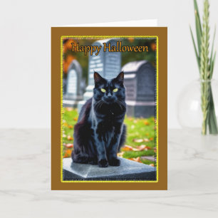 Schwarze Katze auf dem Friedhof an Halloween Feiertagskarte