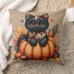 Schwarze Katze auf Kürbis mit Herbstquiltmuster Kissen