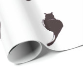 Schwarze Katze auf weißem Packpapier (Rolleneckpunkt)