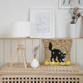 Schwarze Katze auf weißgelben Niedlichen, modernen Kissen