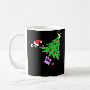 Schwarze Katze, die Weihnachtsbaum über Katzenkatm Kaffeetasse