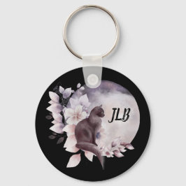 Schwarze Katze durch einen magischen Vollmond Schlüsselanhänger