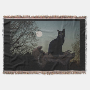 Schwarze Katze in einem Baum vor Vollmond Decke