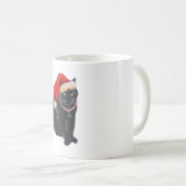 Schwarze Katze in Santa-Mütze Kaffeetasse (VorderseiteRechts)