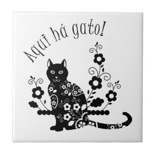 Schwarze Katze mit Blume und portugiesischer Auspr Fliese