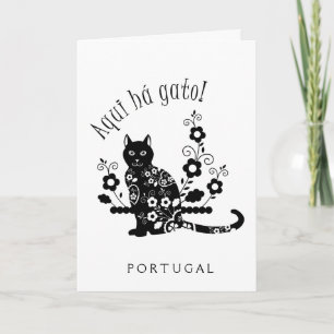 Schwarze Katze mit Blume und portugiesischer Auspr Karte