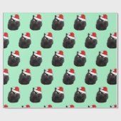 Schwarze Katze mit einer Weihnachtsmannmütze Geschenkpapier (Flach)