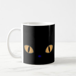 Schwarze Katze mit großen orangefarbenen Augen Kaffeetasse