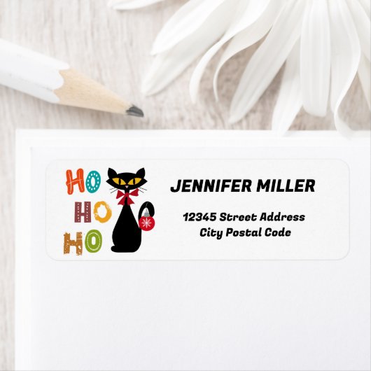 Schwarze Katze mit Ho Ho Ho Textdesign (Insitu)