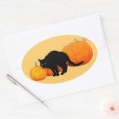 Schwarze Katze mit Pumpkins anordnen Ovaler Aufkleber (Umschlag)