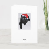 Schwarze Katze mit roter Weihnachtsmannmütze Feiertagskarte (Rückseite)