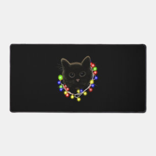 Schwarze Katze mit Weihnachtsbeleuchtung Schreibtischunterlage