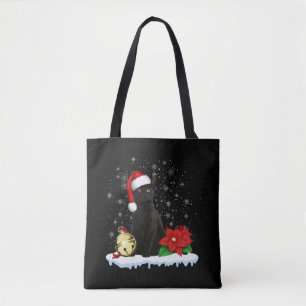 Schwarze Katze mit Weihnachtskostüm der Weihnachts Tasche
