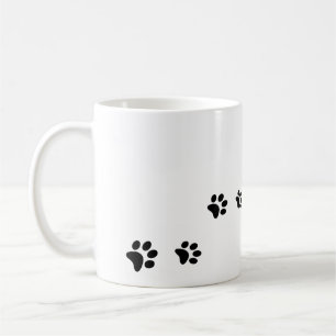 Schwarze Katze Pfoten auf Weiß Kaffeetasse