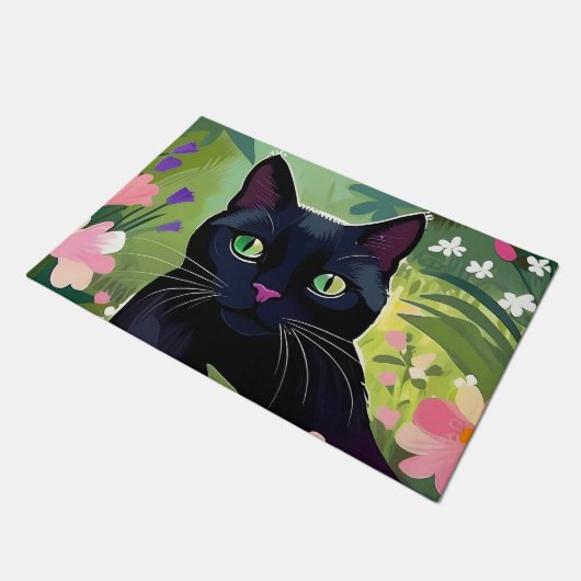 Schwarze Katze sitzt auf einem Feld von Blume Fußmatte (Schrägansicht)