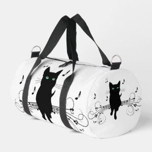 Schwarze Katze umgeben von flüsternden Noten der M Duffle Bag