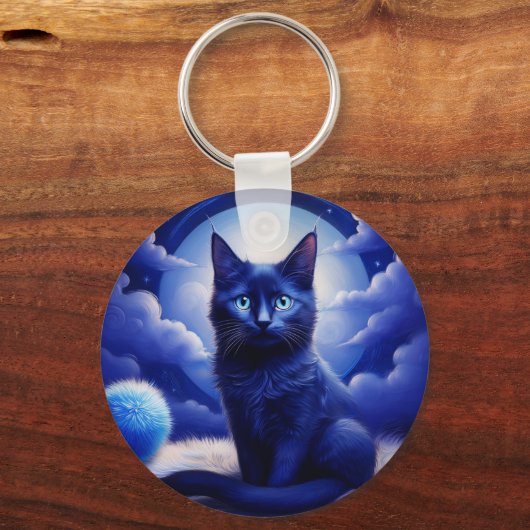 Schwarze Katze vor dem Hintergrund eines blauen Mo Schlüsselanhänger (Vorderseite)