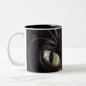 Schwarze Katze, weiße Bärte, grüne Augen Zweifarbige Tasse (Links)