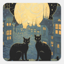 Schwarze Katzen auf dem Dach