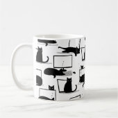 Schwarze Katzen auf Laptops Kaffeetasse (Links)