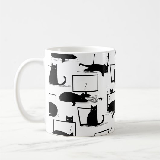 Schwarze Katzen auf Laptops Kaffeetasse (Links)